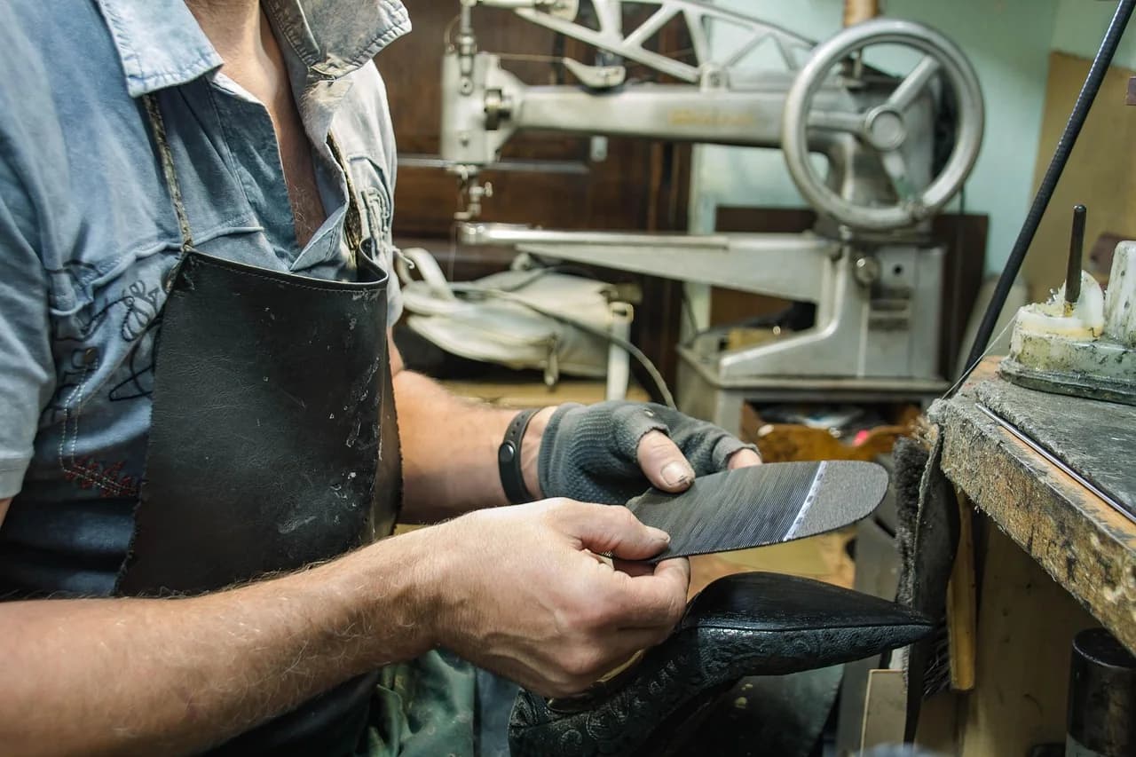 Craftsperson preparing a footwear sample